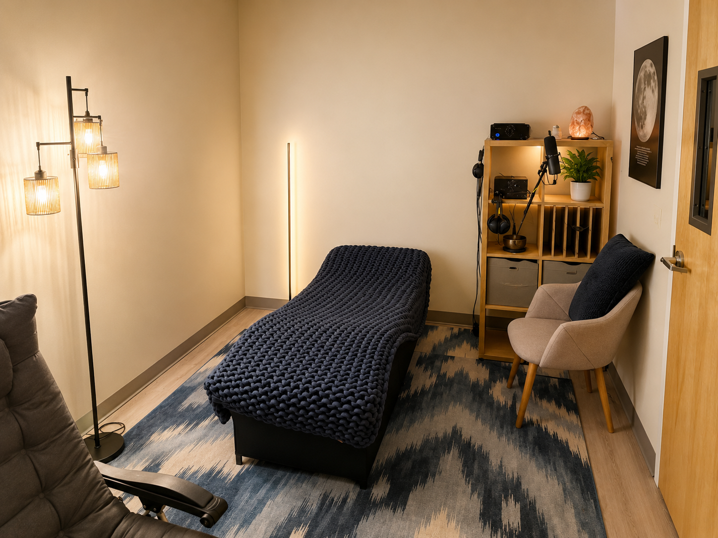 Sage Sound Lounge with weighted blanket chaise, ambient lighting, and audio equipment